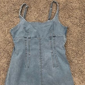 Denim mini dress with zipper on side. Size large. From Urban Outfitters